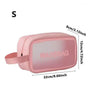 Pink clear waterproof travel toiletry bag with a strap and measurements
