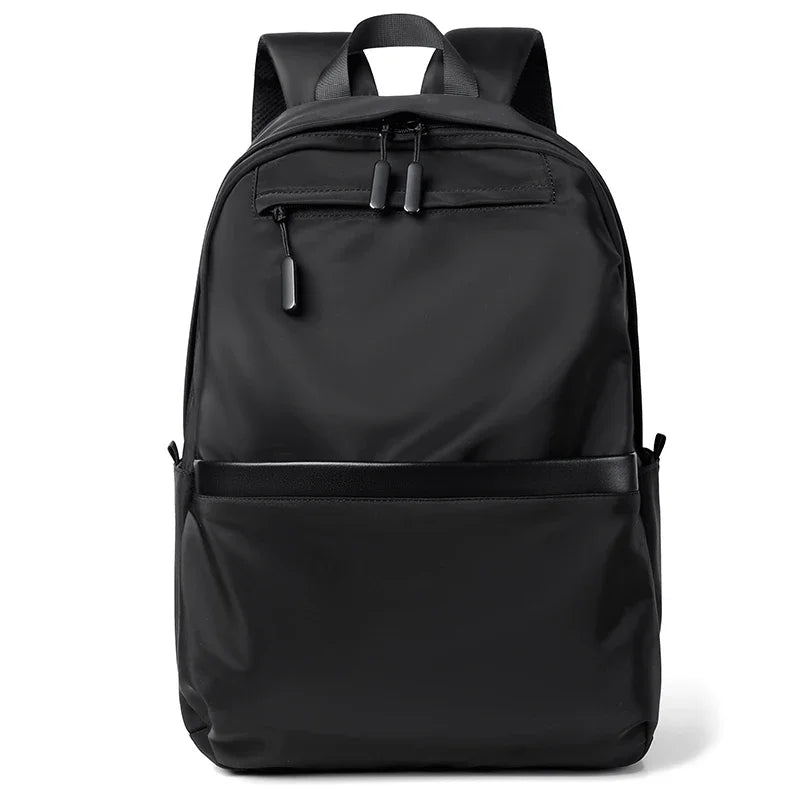 A black men's lightweight laptop backpack shown from the front.