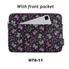A black laptop sleeve with a front pocket decorated with colorful floral patterns.