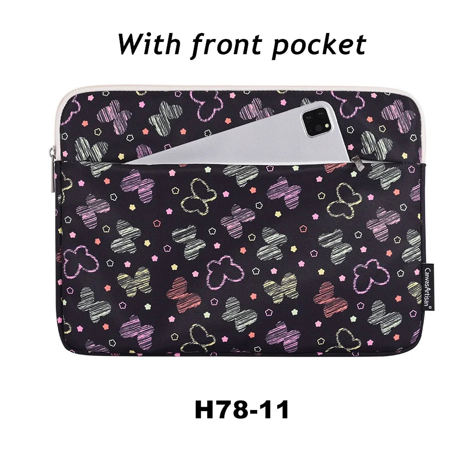 A black laptop sleeve with a front pocket decorated with colorful floral patterns.