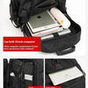 A black durable travel backpack showing various compartments and pockets for electronics and organization.