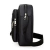 Sac de poitrine extérieur noir unisexe multi-couches avec fermeture éclair et sangle réglable.