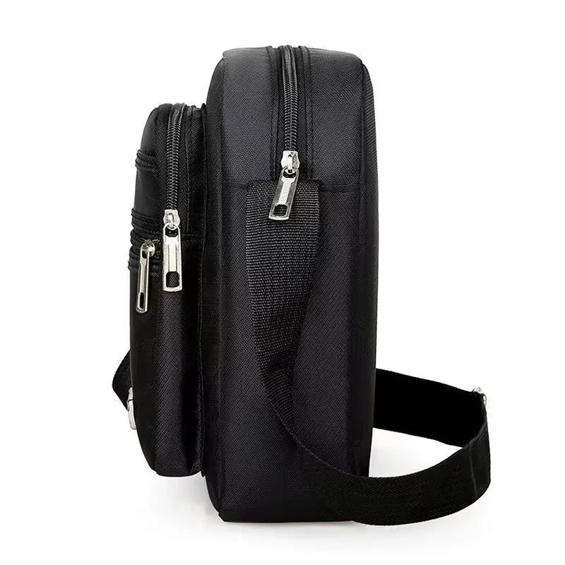 Sac de poitrine extérieur noir unisexe multi-couches avec fermeture éclair et sangle réglable.