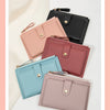 A collection of five ultra-thin PU leather card holder wallets in various shades of pink and blue.