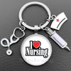 Silver keychain featuring a heart and the word Nursing with a stethoscope charm.