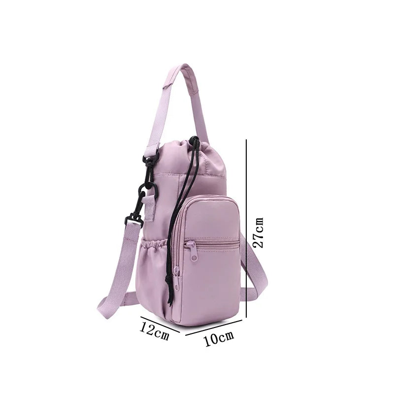 A light purple insulated water bottle crossbody bag with a zippered phone pocket shown from the side.