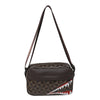 A brown leather crossbody coin purse and mobile phone bag with a patterned exterior and a black strap.
