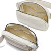Ivory fleece crossbody belt bag with a zipper and soft white sherpa lining