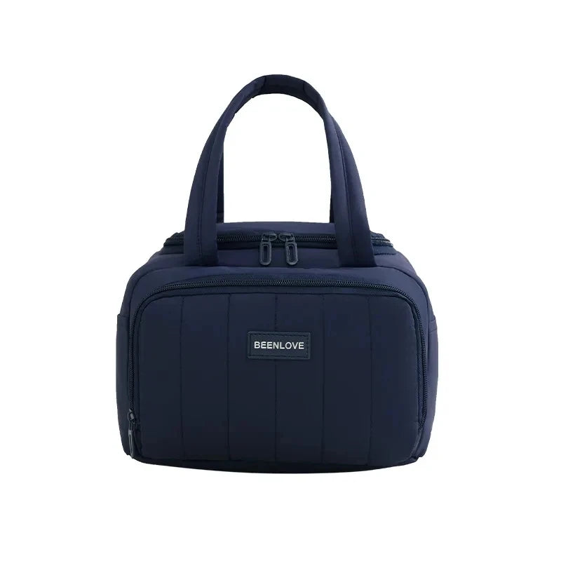 Bolso térmico acolchado azul marino con asa y herrajes plateados