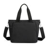 A black durable nylon tote bag with black straps and a zipper closure.