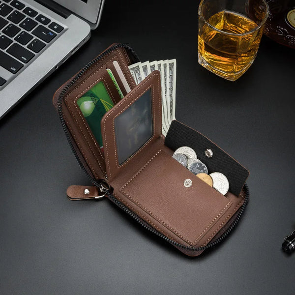 A brown retro PU leather men's wallet is open, showing cash and coins, resting on a dark surface next to a laptop.