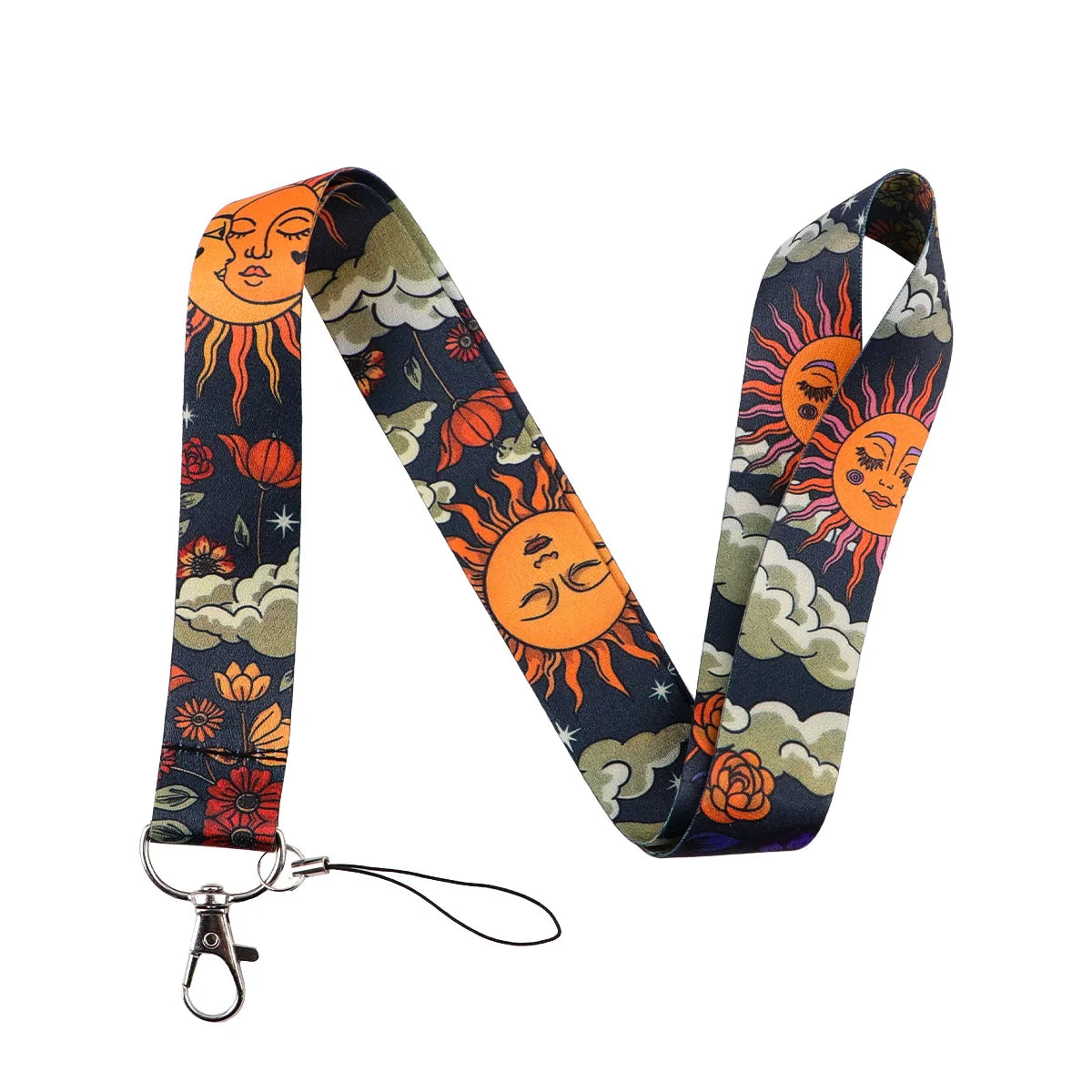 A patterned fabric lanyard featuring orange sun faces and floral designs on a dark blue background.