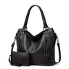 Black women's PU leather crossbody tote bag with a flap closure and shoulder strap.