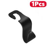 A single black car seat back hook used for trunk organization.