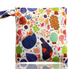 A colorful reusable waterproof snack bag featuring various floral and nature patterns.