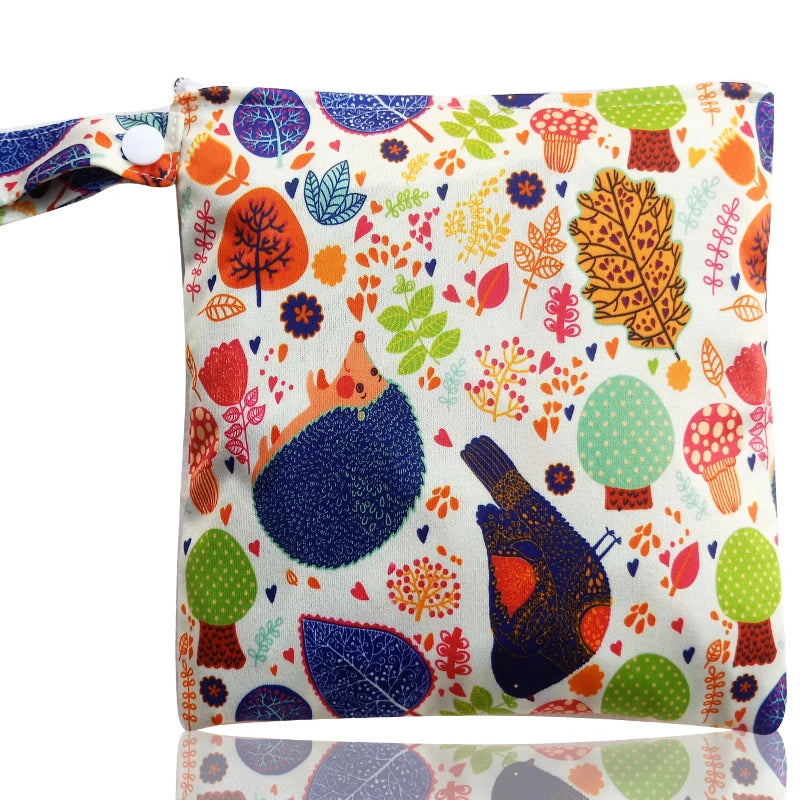 A colorful reusable waterproof snack bag featuring various floral and nature patterns.
