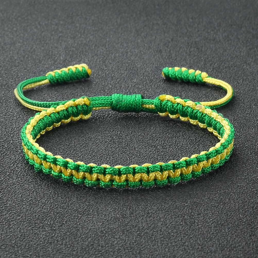 Handmade braided rope bracelet featuring green and yellow threads, suitable as a friendship gift.