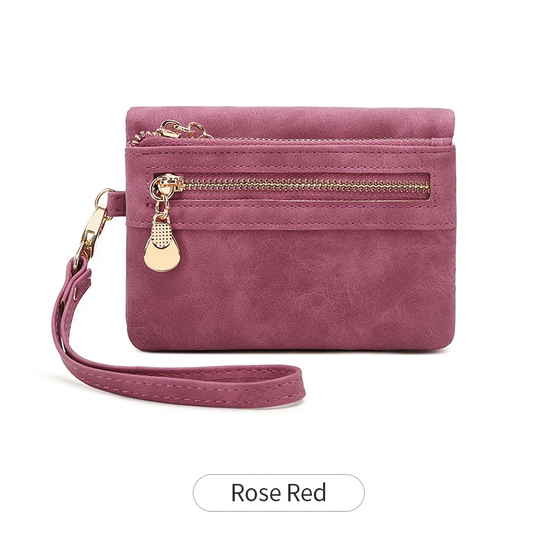 Cartera de cuero PU rosa malva retro con cremallera plegable y dije dorado.