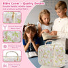 A girl and boy look at a pink floral quilted Bible cover with a zipper and handle.