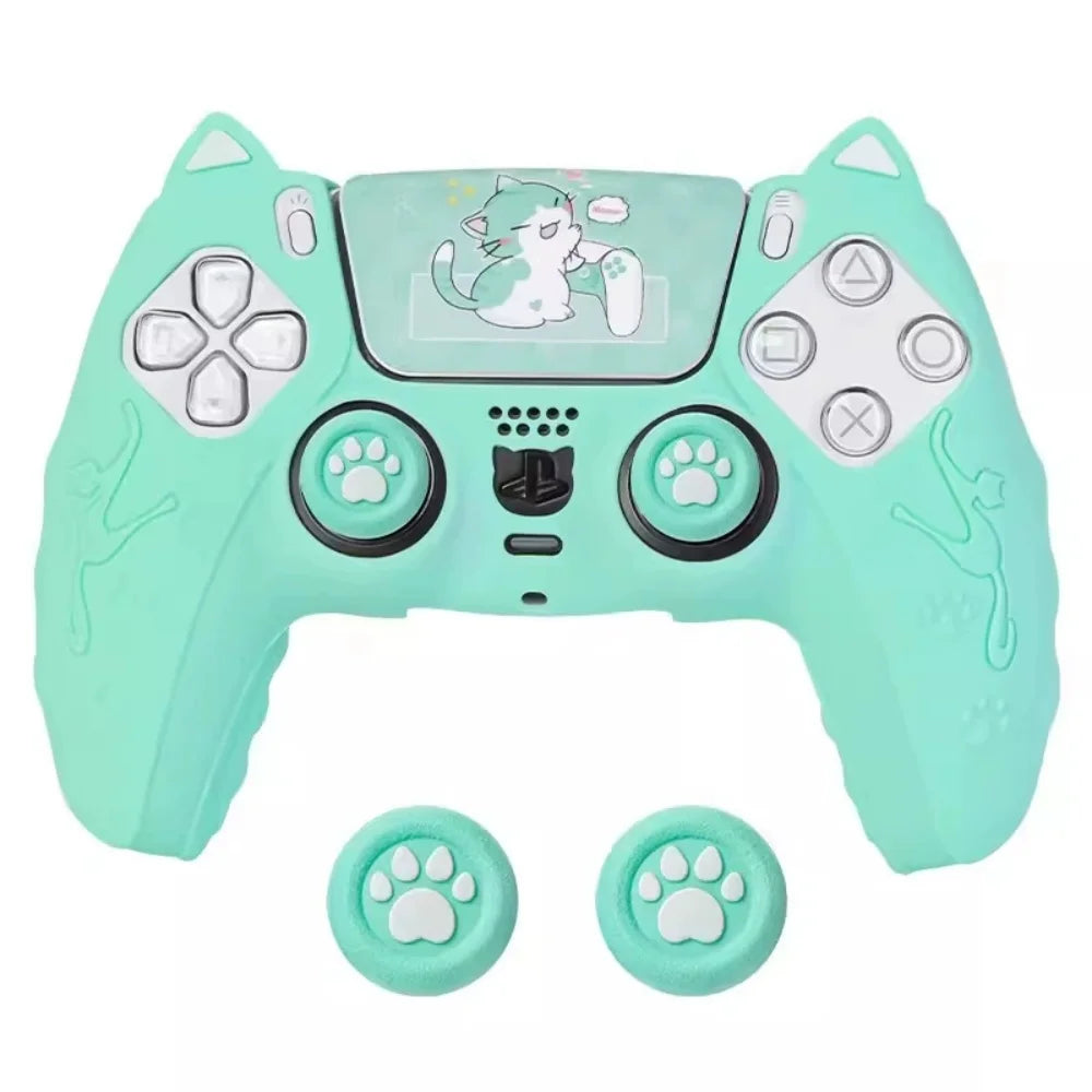 A teal silicone grip cover for a PlayStation controller featuring a cat design and paw buttons.