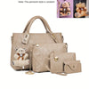 A beige fashion embossed PU handbag set featuring a large tote bag and a smaller wallet, with a teddy bear charm visible.