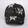 Black mesh snapback baseball cap decorated with sparkling floral embroidery
