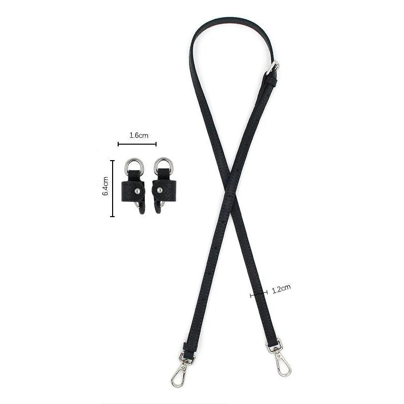 Kit de correa de cuero negro para hombro con ajuste de longitud y herrajes metálicos.
