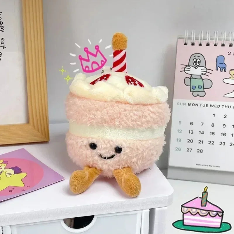 A pink bread plush toy with a striped crown on top, sitting on a white surface.