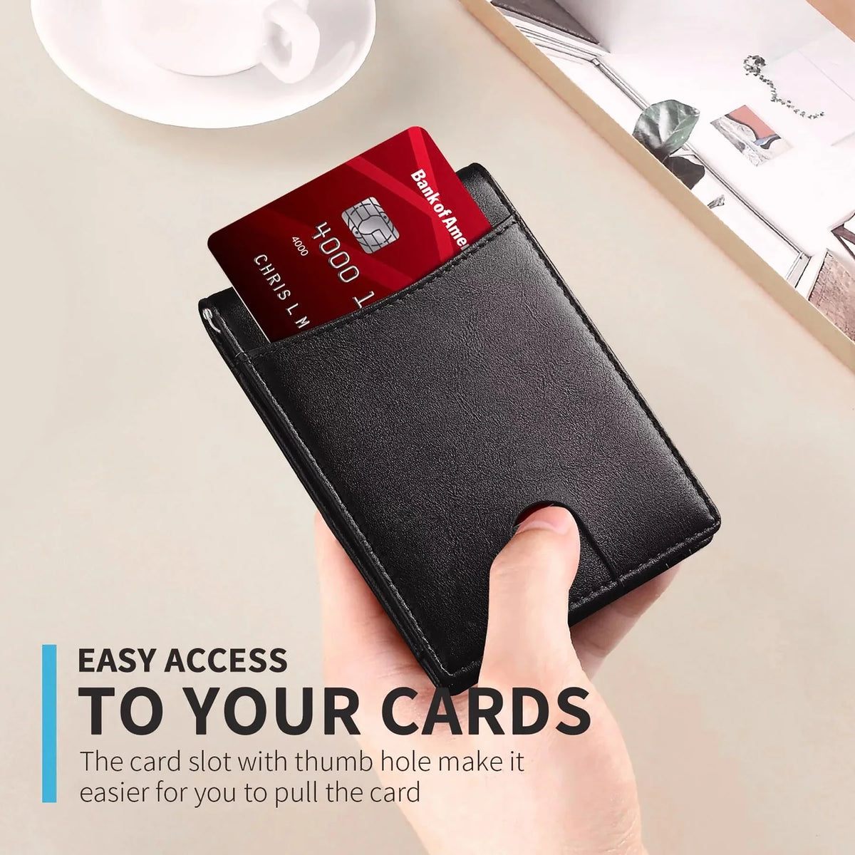 A hand holds a black slim bifold wallet with a thumb hole, displaying a bank card.