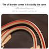 Close-up of a restored genuine Vachetta leather bag strap showing natural tan and red accents on a dark brown background.
