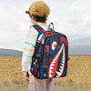 A person wearing a beige hat is shown from the back, carrying a black and red patterned waterproof anti-theft casual travel b