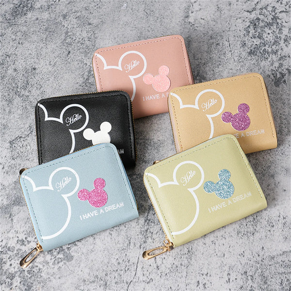 A collection of five pastel-colored cartoon mini zipper coin purses featuring Mickey Mouse silhouettes and glitter accents.