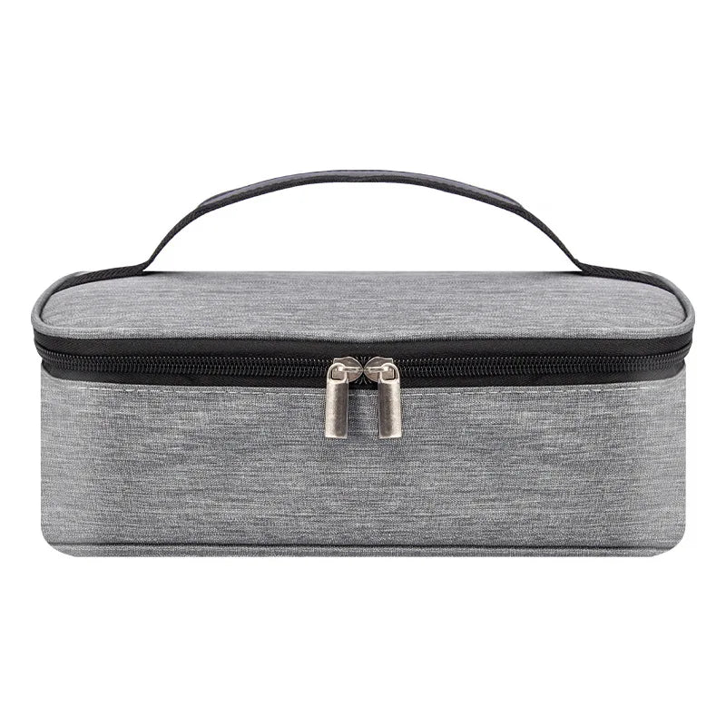 A gray insulated mini lunch bag with a black zipper and silver snaps.
