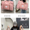 Pink canvas travel storage bag with adjustable pull rod design shown in use.