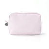 A pink seersucker striped cosmetic bag with a zipper closure.