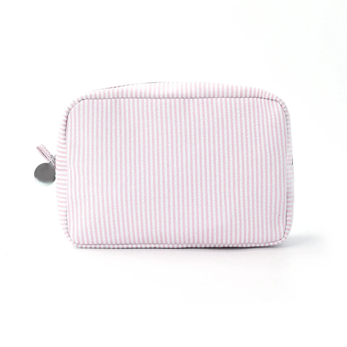 A pink seersucker striped cosmetic bag with a zipper closure.