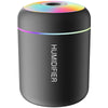 A black mini USB electric aroma diffuser with a multicolored light ring on top.