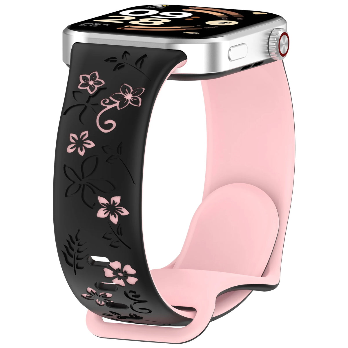 Una correa de silicona rosa con estampados florales negros para un reloj inteligente.