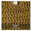 Close-up of a woven straw fabric texture used for a handbag.