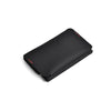 A black magnetic foldable ID card holder and coin purse shown from above.