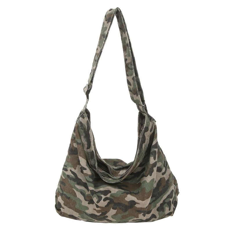 A canvas camouflage shoulder bag with an adjustable strap.