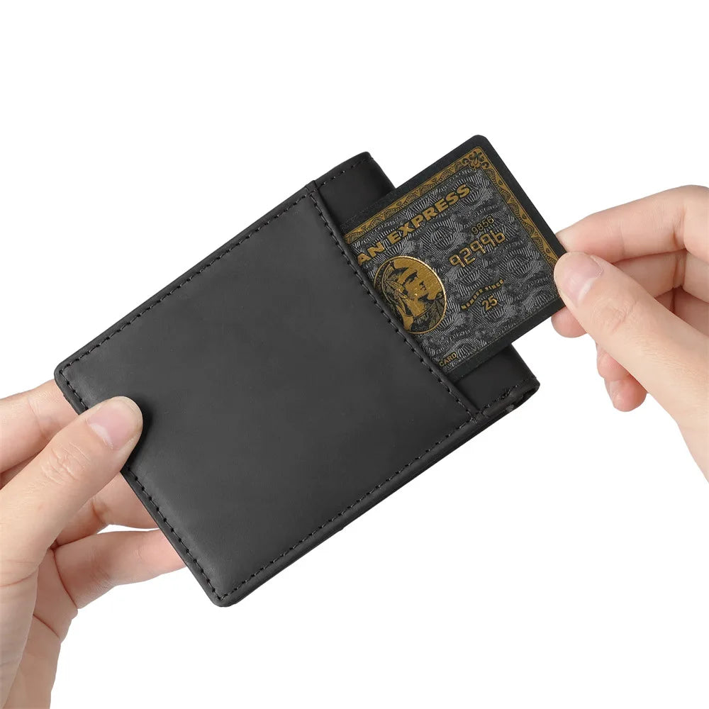 A black leather wallet with an embossed card is held by a hand.