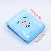 Light blue fabric wallet embroidered with a small animal design