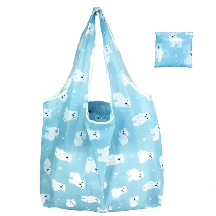 Light blue reusable fashion shopping tote bag featuring white animal print designs