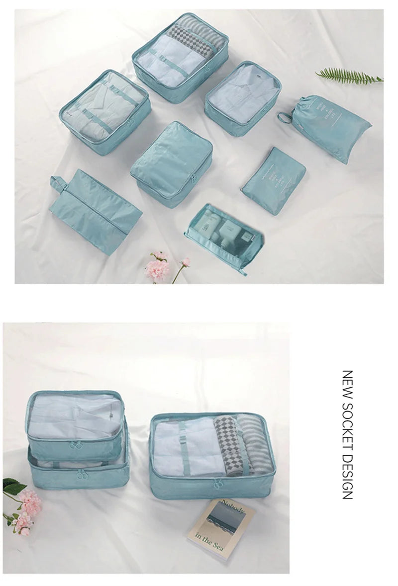 A collection of seven light blue fabric storage bags and organizers arranged on a white surface.