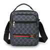 A black patterned sling bag with a black strap and gold hardware.
