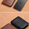 A brown leather wallet and a black leather case are displayed on a tan background.