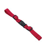 A red adjustable tactical backpack chest strap harness.