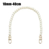 A strand of small white pearls used as a strap for a handbag or purse.