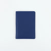 A dark blue customizable PU leather passport holder with a smooth finish.